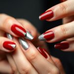 Paznokcie srebrno czerwone z brokatowym zdobieniem na końcówkach